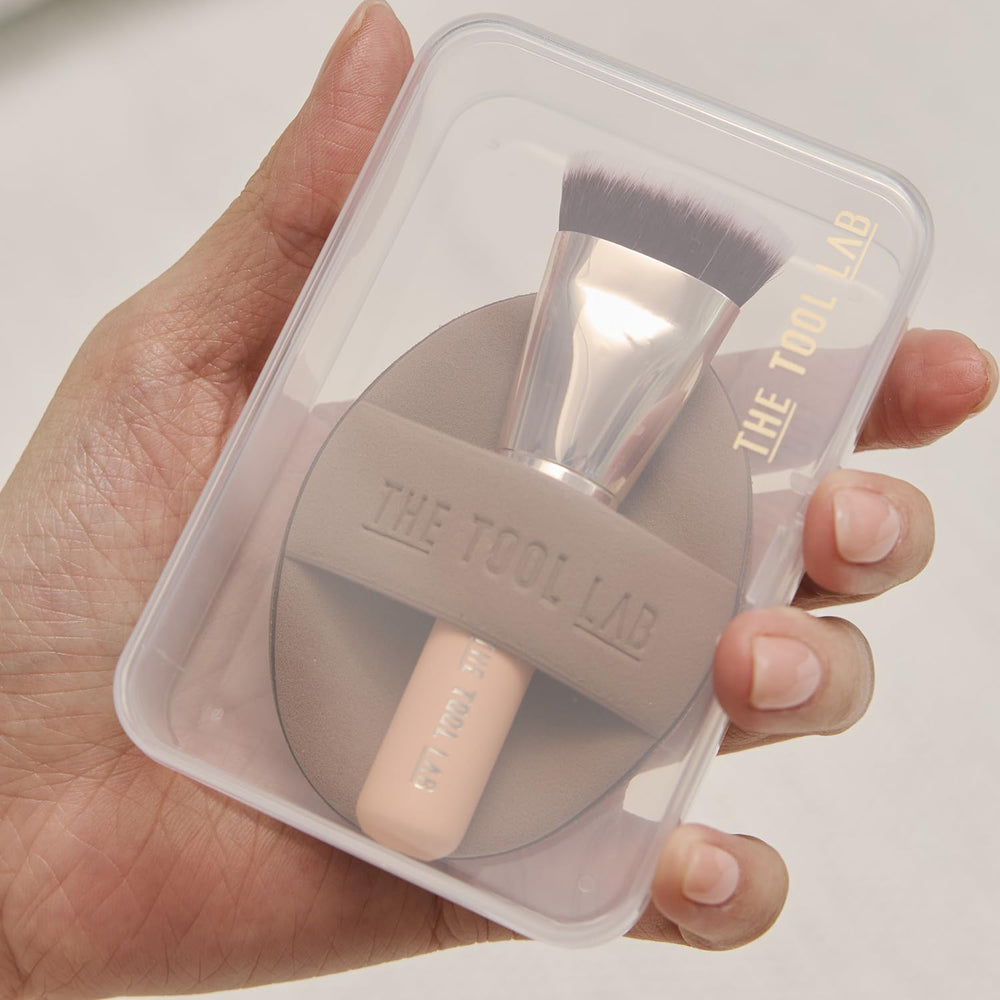 Travel case with brush and sponge ready for quick touch-ups on the go.