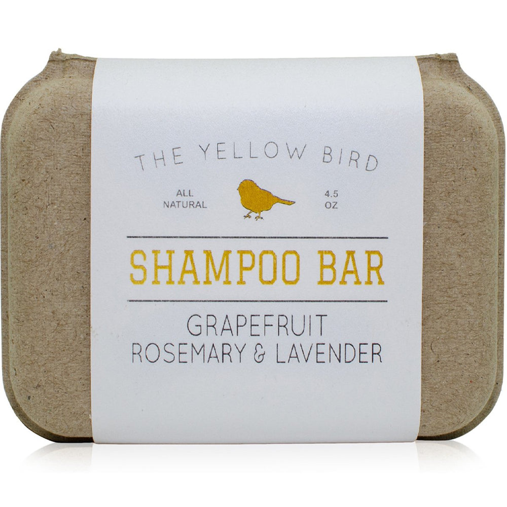 The Yellow Bird solid bar shampoo grapefruit essence closeup for refreshing scalp care.