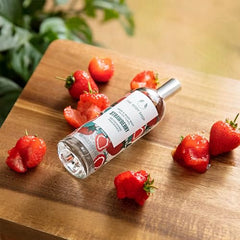 the body shop strawberry body mist spritz action demonstrates quick-drying hydration.