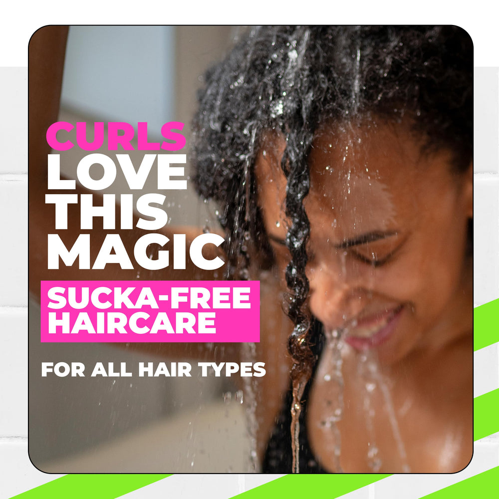The Doux Fresh Rinse detangled curls show smooth, defined texture.