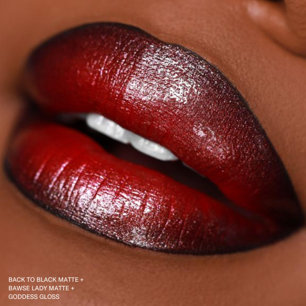 The Lip Bar layer with gloss to add shine demonstrates versatile lip looks.