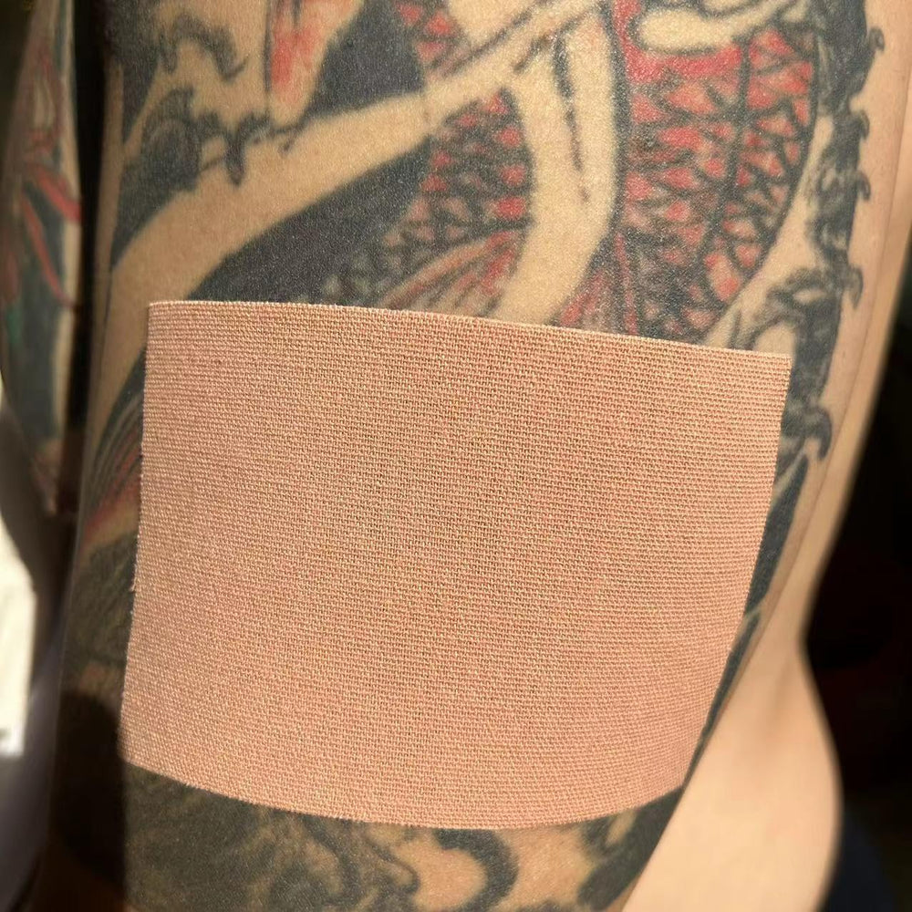 Therasports tattoo cover-up tape on skin demonstrates simple, secure application