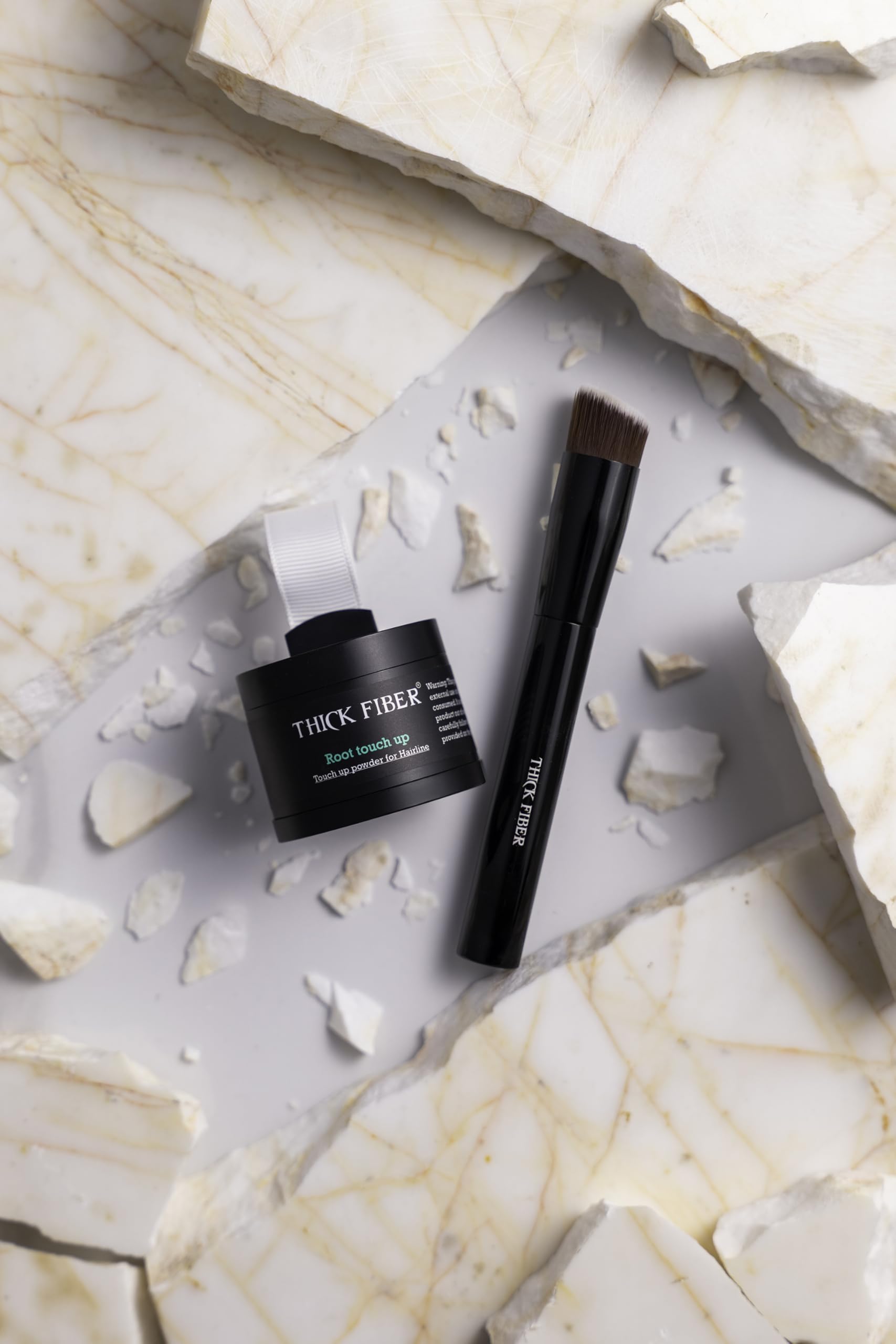 Thick Fiber box includes puff and brush for easy application.