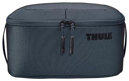 Thule Subterra 2 toiletry bag side view highlighting slim profile for luggage balance