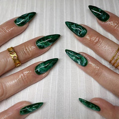 Thuoxde green press-on nails almond medium marble pack ready for an easy at-home manicure.