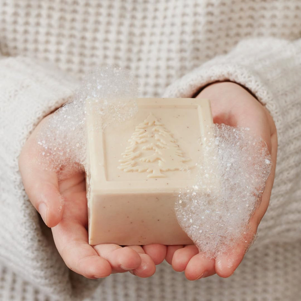Thymes Frasier Fir Bar Soap apricot kernels indicate gentle exfoliation and smoother skin.