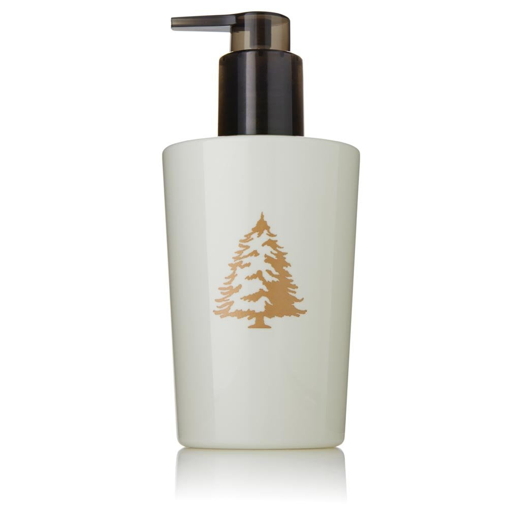 Thymes Frasier Fir hand lotion bottle with refreshing evergreen scent.
