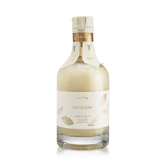 Thymes Goldleaf Bubble Bath bottle showcasing luxurious floral scent.