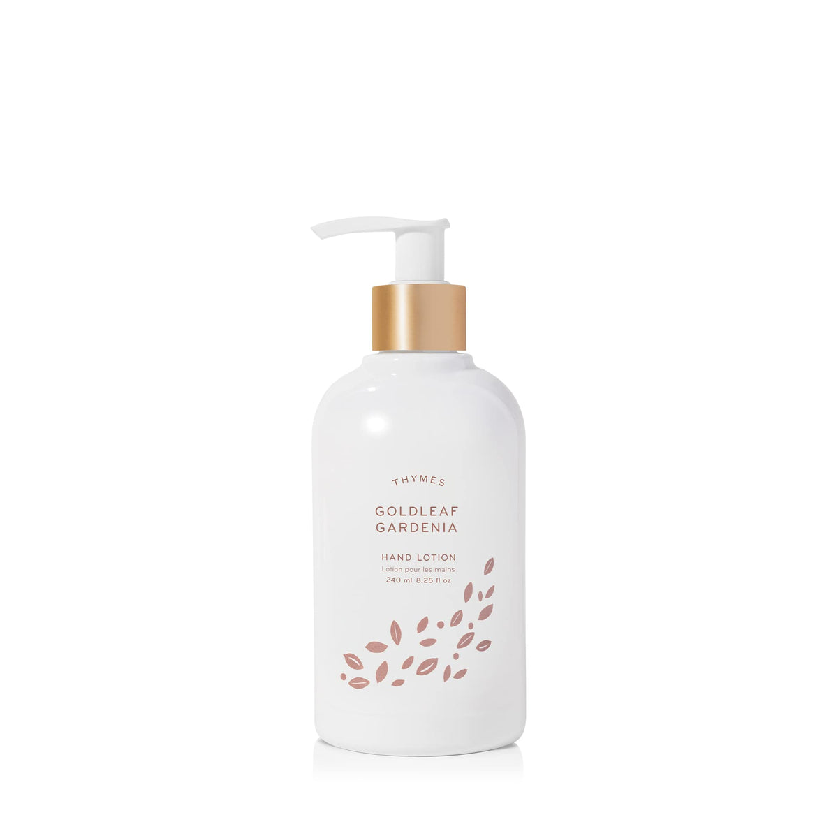 Thymes Hand Lotion Gold Pump bottle close-up, goldleaf detail signaling premium hydration for silky hands.