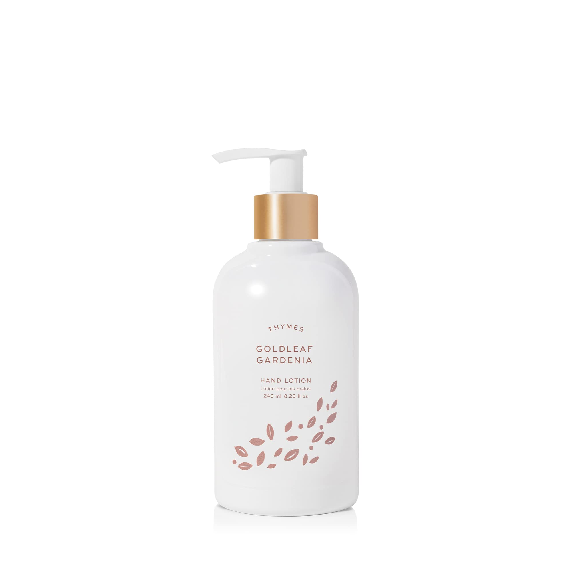 Thymes Hand Lotion Gold Pump bottle close-up, goldleaf detail signaling premium hydration for silky hands.