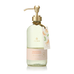 Thymes Hand Wash Mandarin Coriander bottle pours for refreshing cleansing.