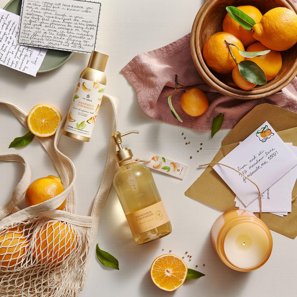 Thymes Mandarin Coriander bottle branding and premium botanical feel.
