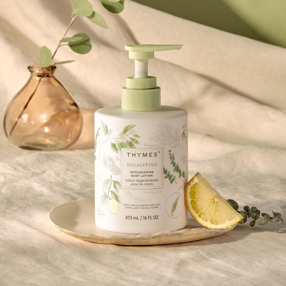 Thymes Large Replenishing Body Lotion bottle side view showing rich texture