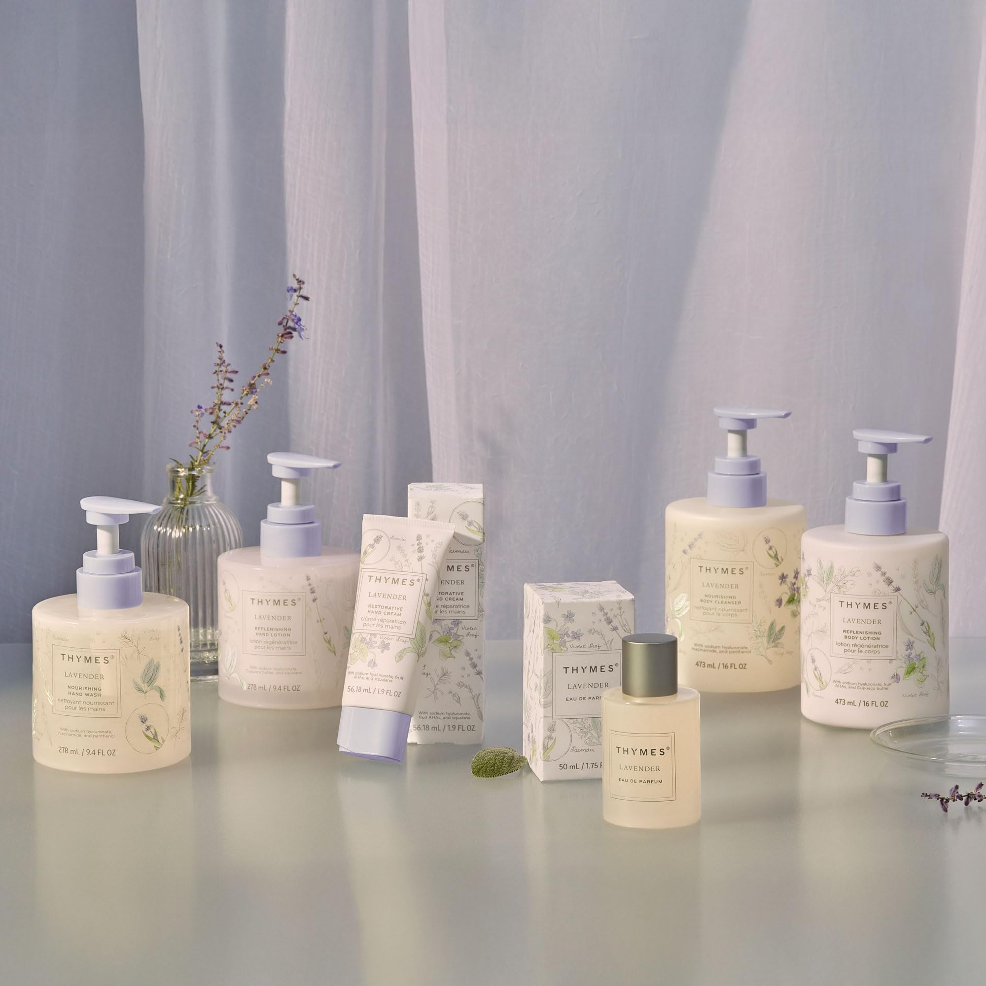 Thymes daily-use lotion being applied to arms or legs