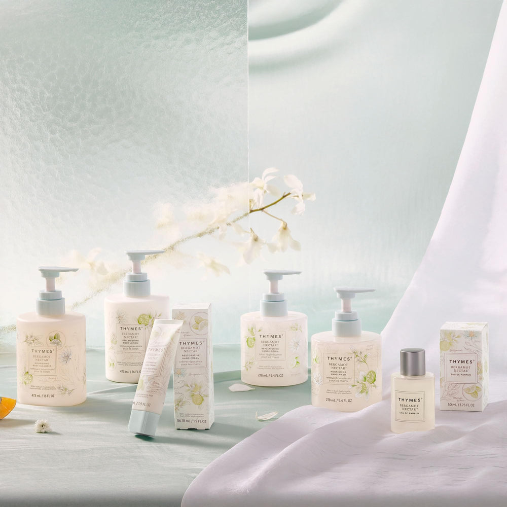 Thymes Nourishing Hand Wash glass bottle packaging displayed on countertop.