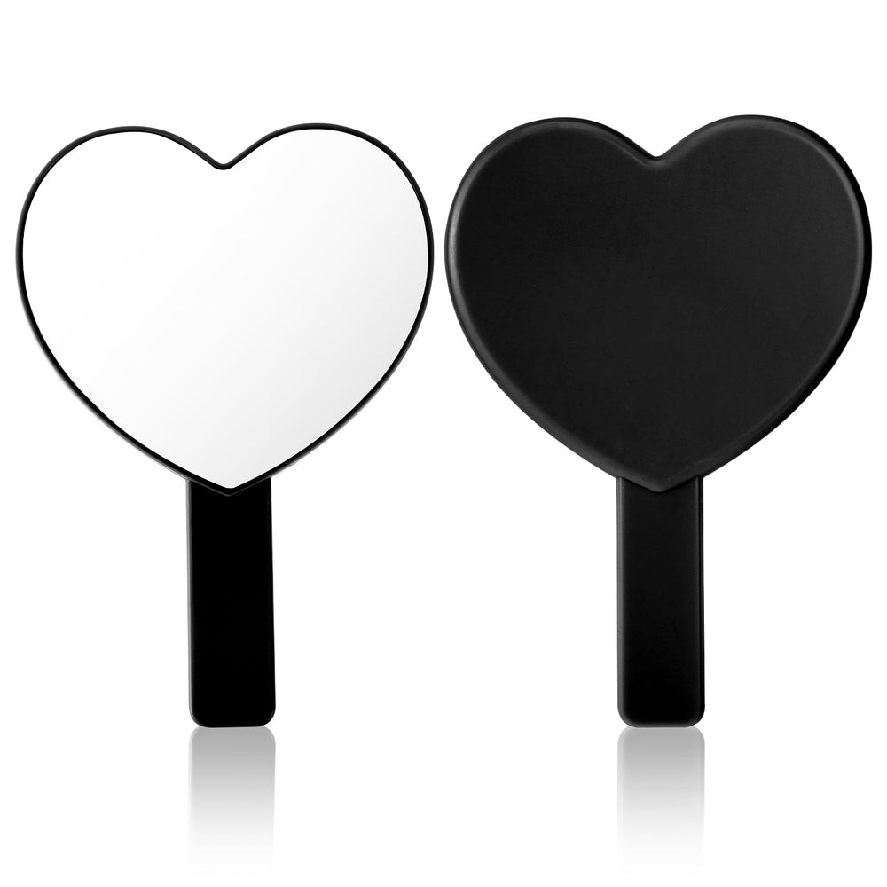 Espejo de TIESOME en forma de corazón para manos, ideal para retoques.