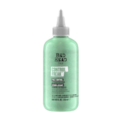 TIGI Control Freak serum bottle demonstrating frizz control for smooth curls.