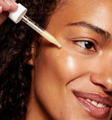 Timeless Skin Care Coenzyme Q10 Serum hyaluronic acid dropper ready for hydrating application.
