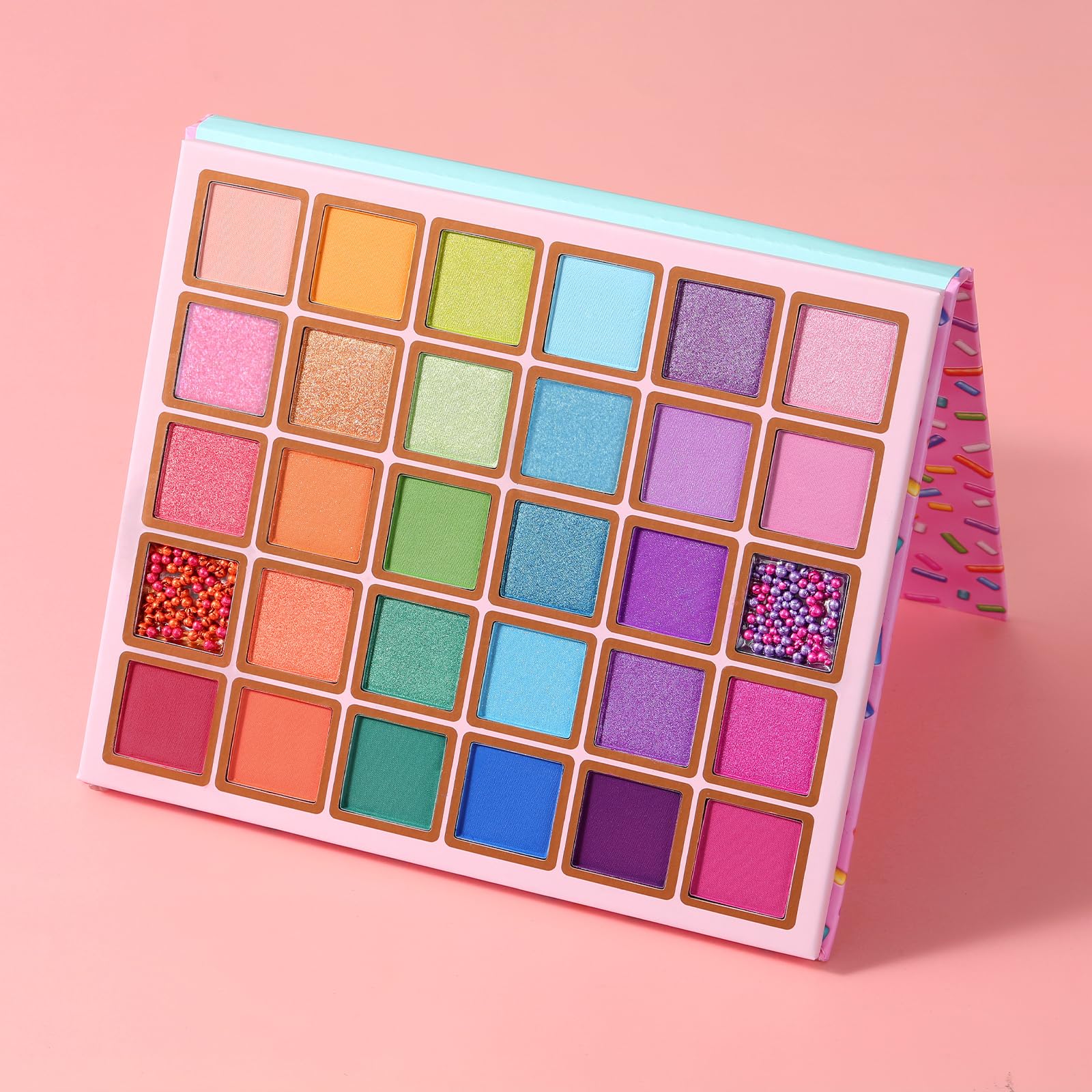 Applying special effects with Tintark eyeshadow for a party-ready look.