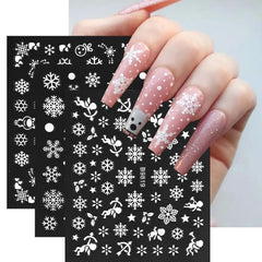 Tiwnefua Christmas nail art setup featuring snowflake designs for holiday sparkle.