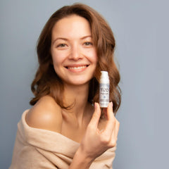 TIZO Eye Renewal SPF20 application swatch demonstrates sheer, invisible finish.