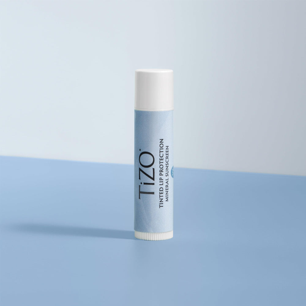 TiZO Lip Protection tinted lip swatch shows natural tint and protection.