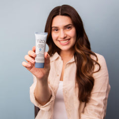 TIZO2 sunscreen primer usage shot showing smooth makeup-ready skin