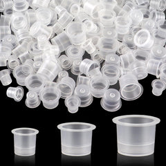 TKYZMS tattoo ink caps 300pcs in clear cups for organized color selection during sessions.