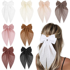 Tobeffect hair bow black close-up showing bold style and secure all-day grip.