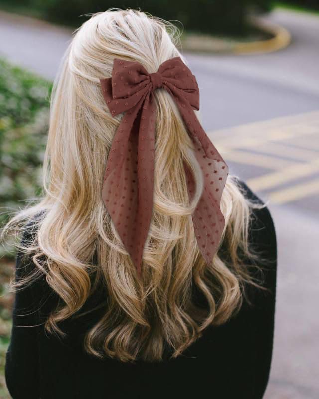 Tobeffect hair bow closeup captures texture and craftsmanship for giftable accessories.