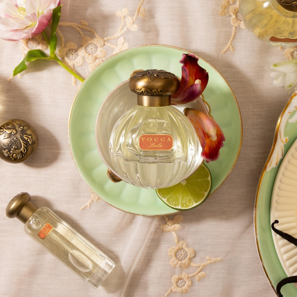 TOCCA Laila cap close-up highlighting premium packaging and elegance.