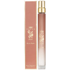 TOCCA Laila travel spray bottle for on-the-go fragrance.