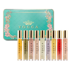 Tocca Luxury Fragrance Wardrobe tin case shows nine travel sprays for on-the-go fragrance.