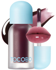 TOCOBO Juicy Berry Lip Oil bottle close-up showing vegan hydration and high shine.