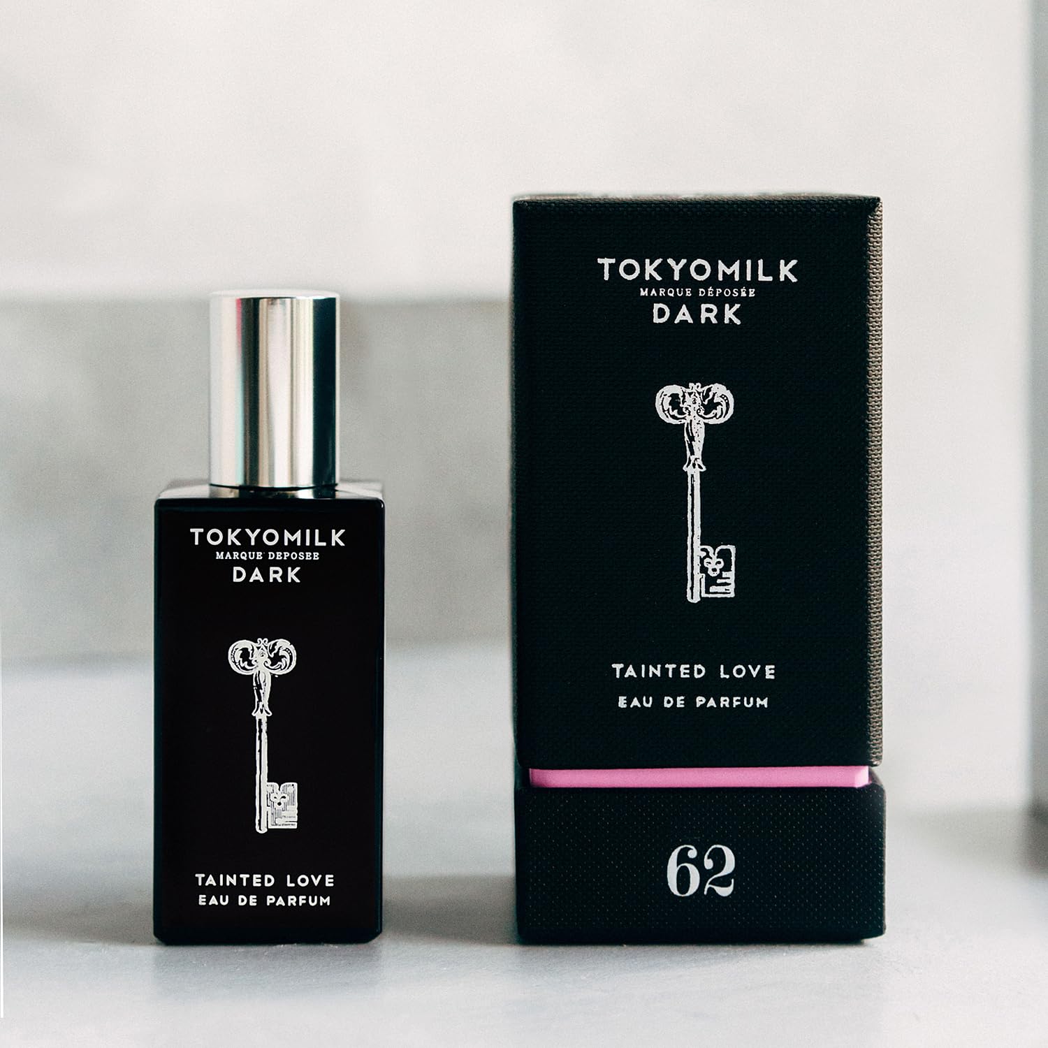 TOKYOMILK Dark Tainted Love dark vanilla bean visual conveys warm daring mood