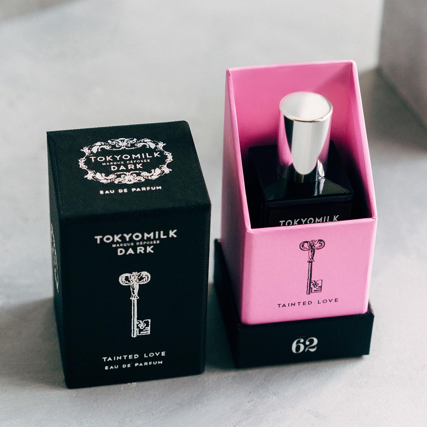 TOKYOMILK Dark Tainted Love white tea sandalwood layer suggests refined balance