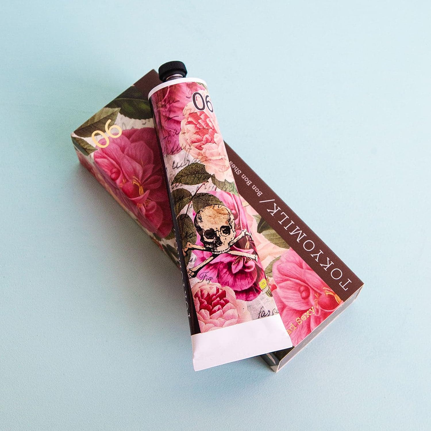 TOKYOMILK Dead Sexy Handcreme texture closeup highlights rich shea butter for moisturization.