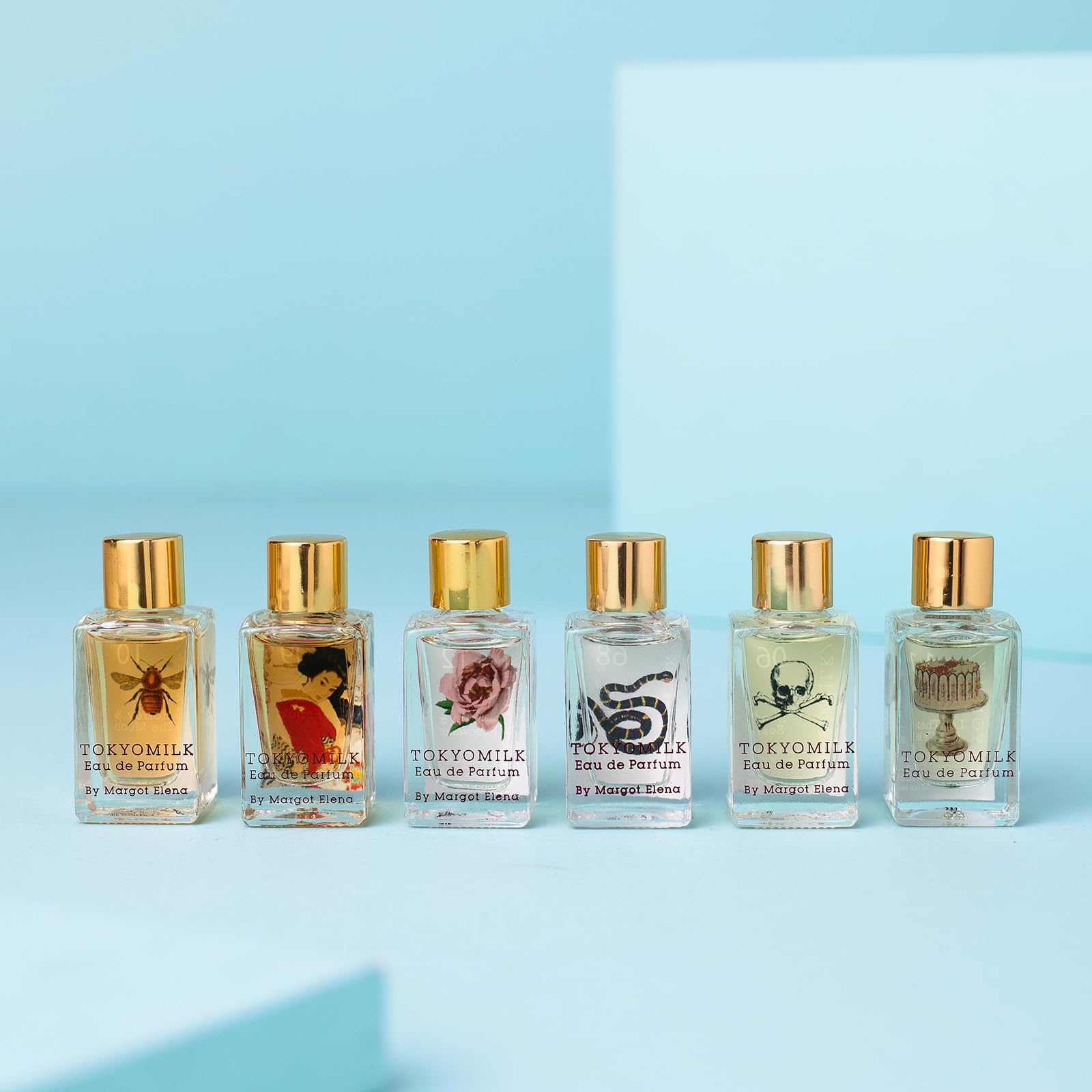 TOKYOMILK glass bottles with decorative art evoke premium, gift-ready presentation