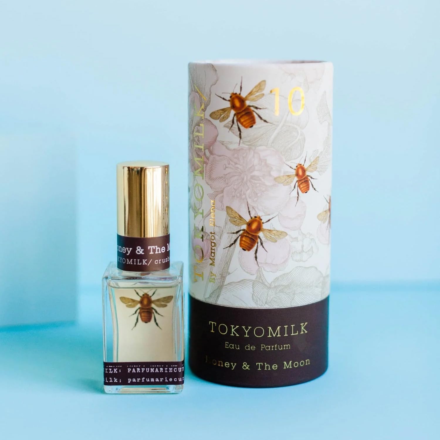 TOKYOMILK Honey & The Moon fragrance swirl evokes violet and jasmine for mood lift.