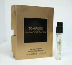 Tom Ford Black Orchid promo vial cap closeup shows compact travel design.