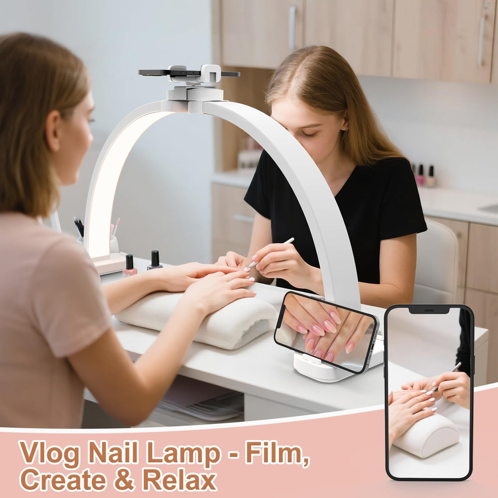 TONYFUL Half Moon Light with a 31-inch arch illuminating a wide work surface for tattoos and nails.