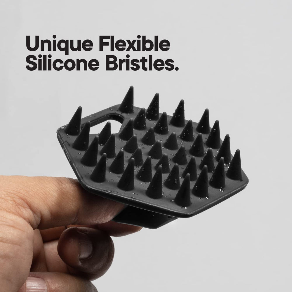 TOOLETRIES Beard Scrubber ergonomic handle image emphasizes comfortable grip during exfoliation