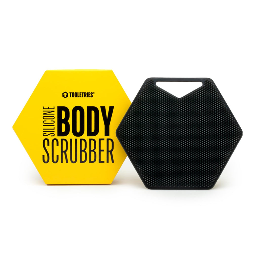 TOOLETRIES Body Scrubber close-up shows charcoal-bristles for deep exfoliation and refreshed skin