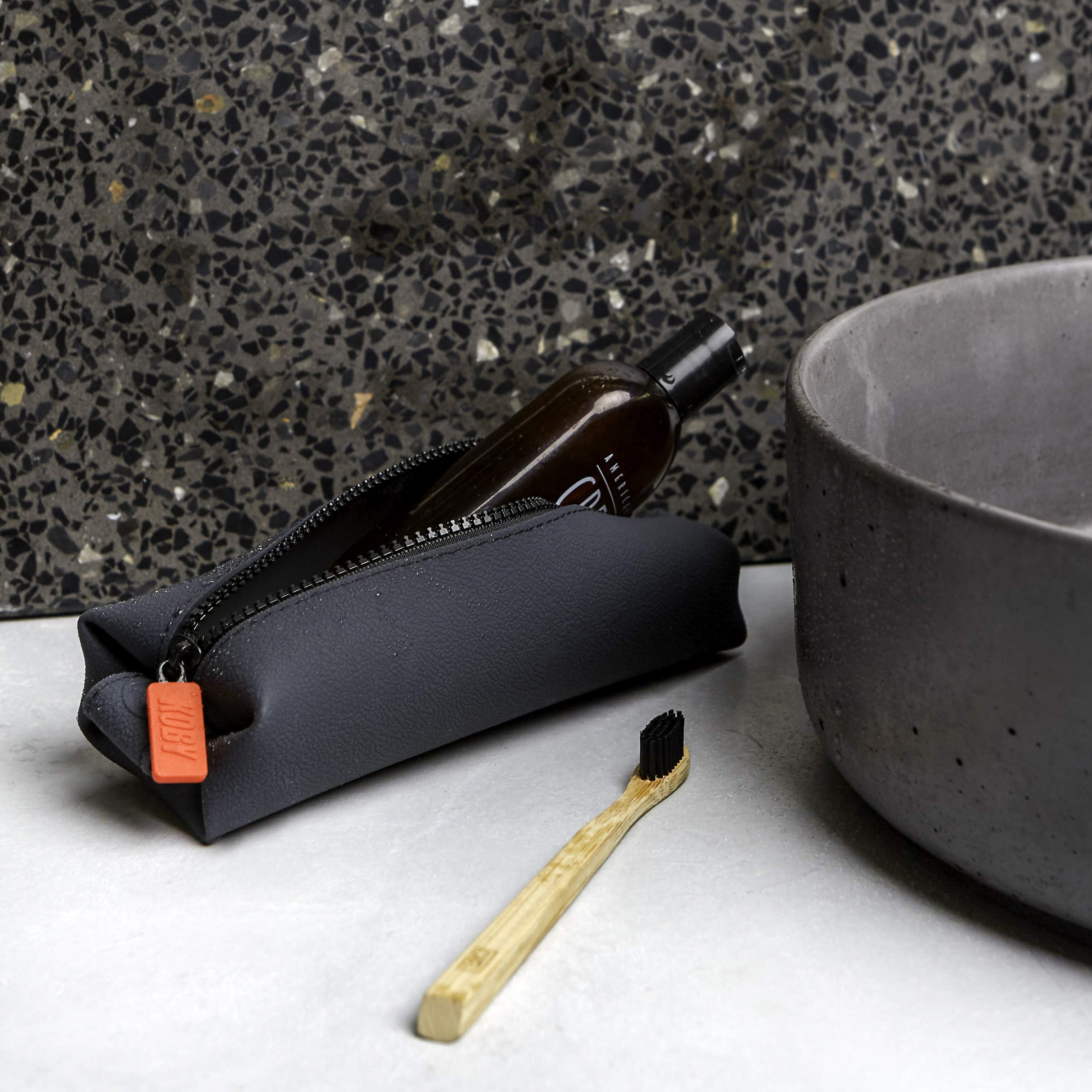 TOOLETRIES Koby Mini easy-clean silicone surface for quick maintenance.