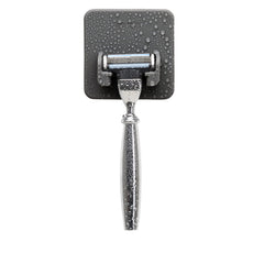 TOOLETRIES Mason Razor Holder front view shows secure silicone grip on a bathroom surface