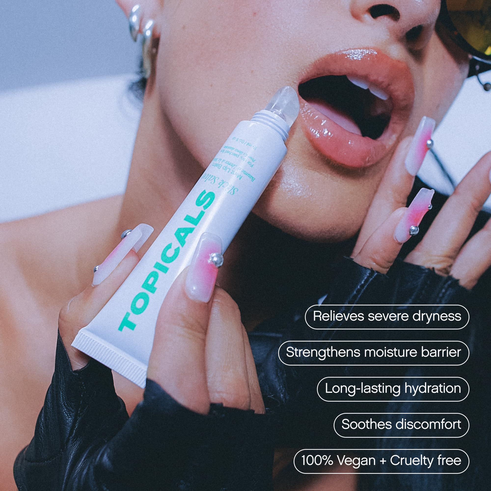 Topicals Slick Salve Mint lip balm application close-up shows minty glide and smooth finish.