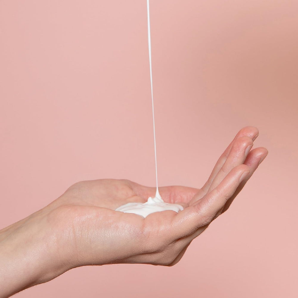 Topicrem Ultra-Moisturizing Body Milk 1000ml ingredients jar highlights hydration formula for dry skin.