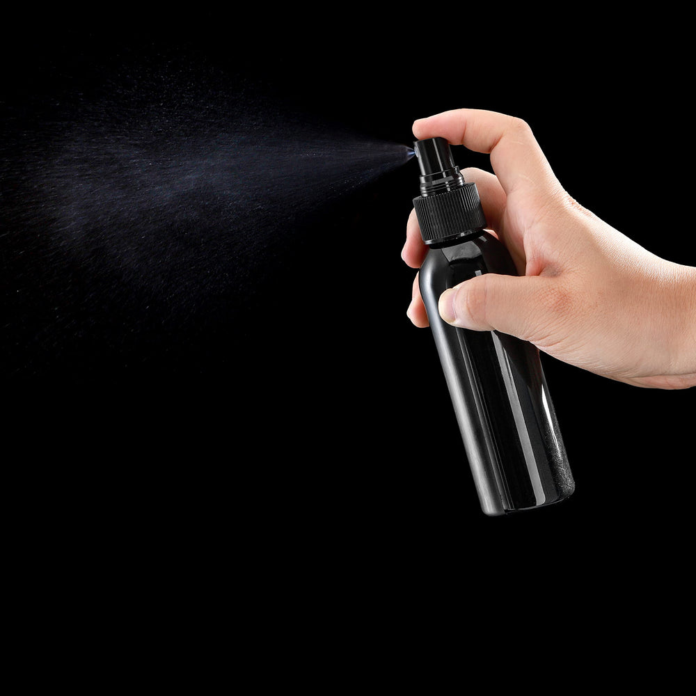 TOPZEA 4 oz bottle cap closeup, dust-proof cap protects nozzle during travel.
