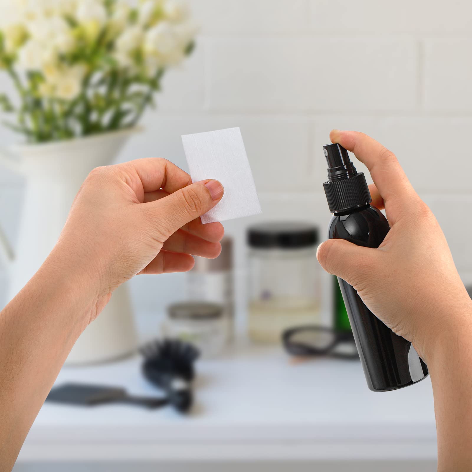 TOPZEA black bottle against white background, multipurpose application potential.