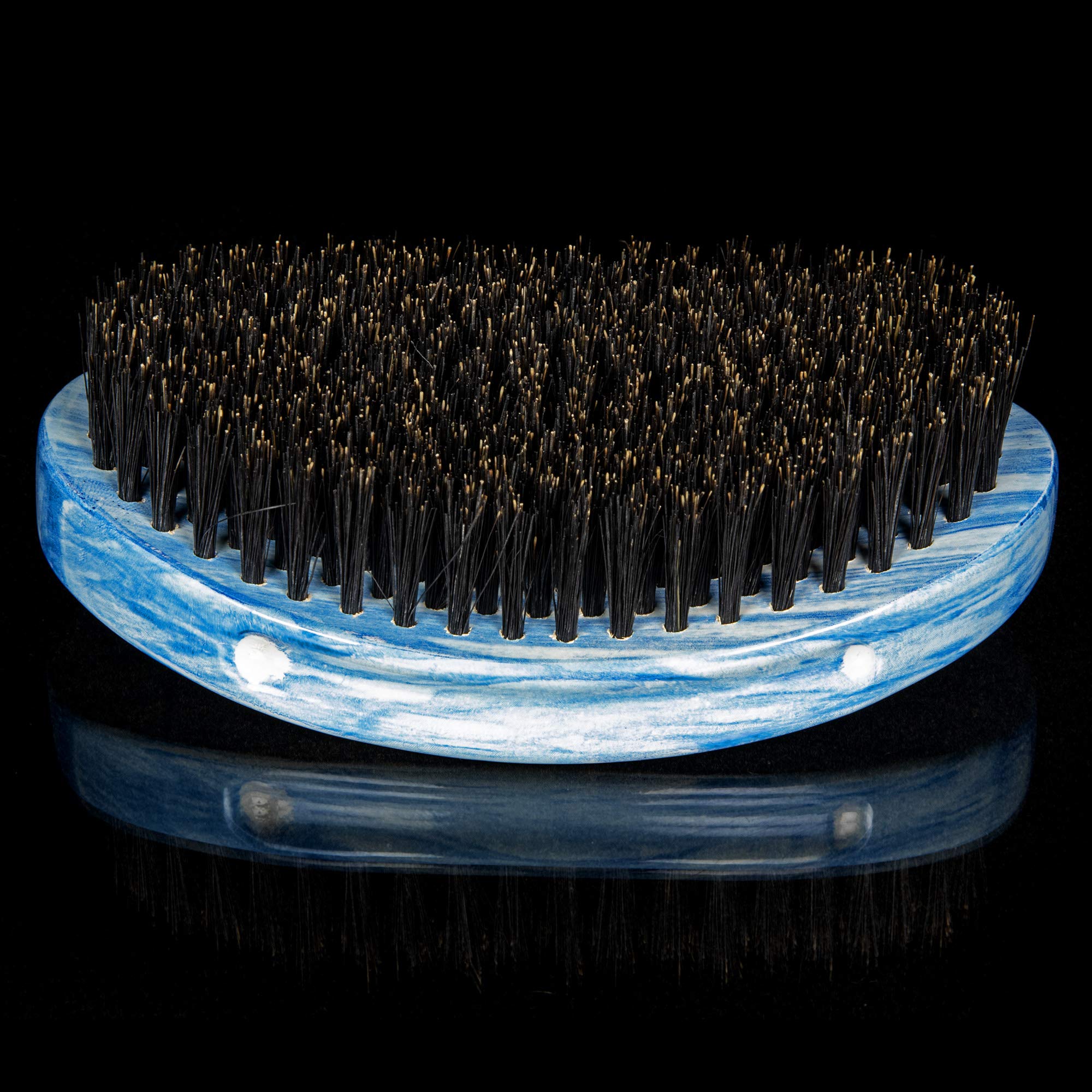 Torino Pro Brush in hand demonstrates ergonomic grip for daily use